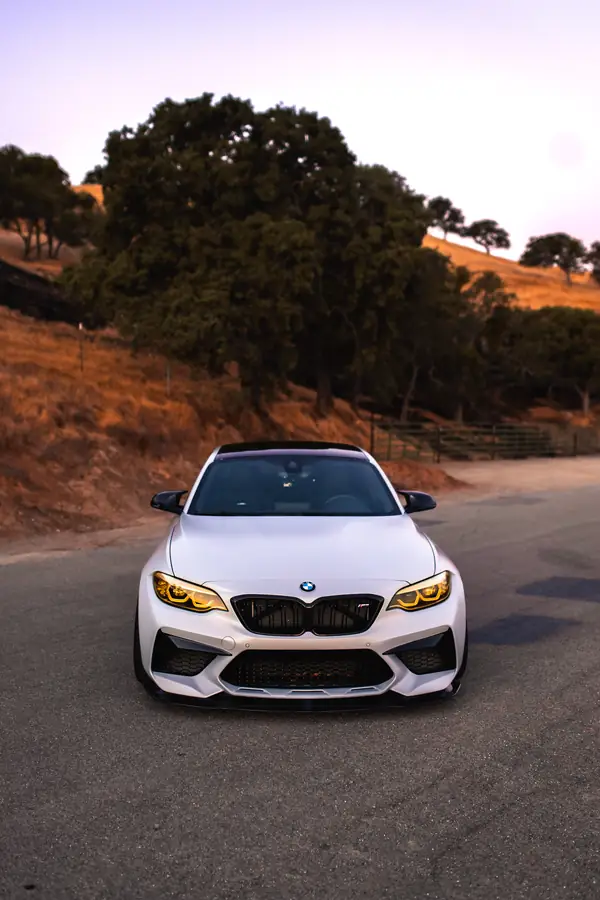 Front view of the M2 Competition at golden hour