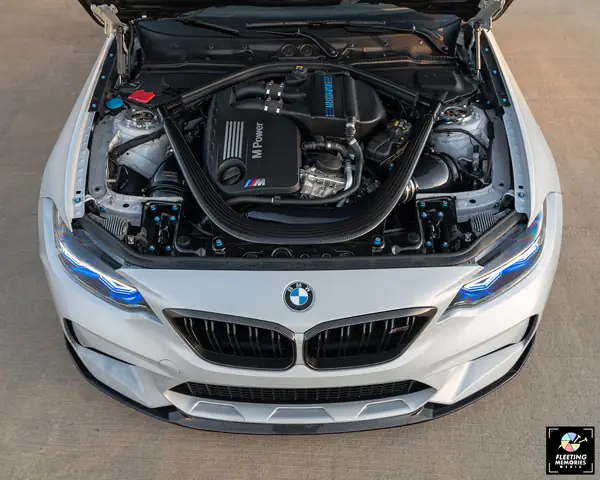 Engine bay with carbon intake