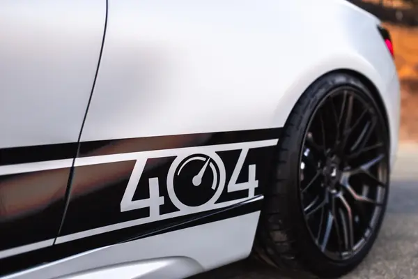 404 livery stripe close-up on the rear quarter